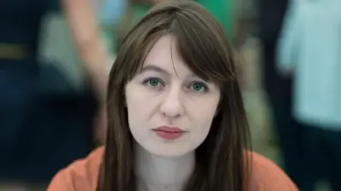 Irish author Sally Rooney declares she cannot enter the UK due to arrest fears